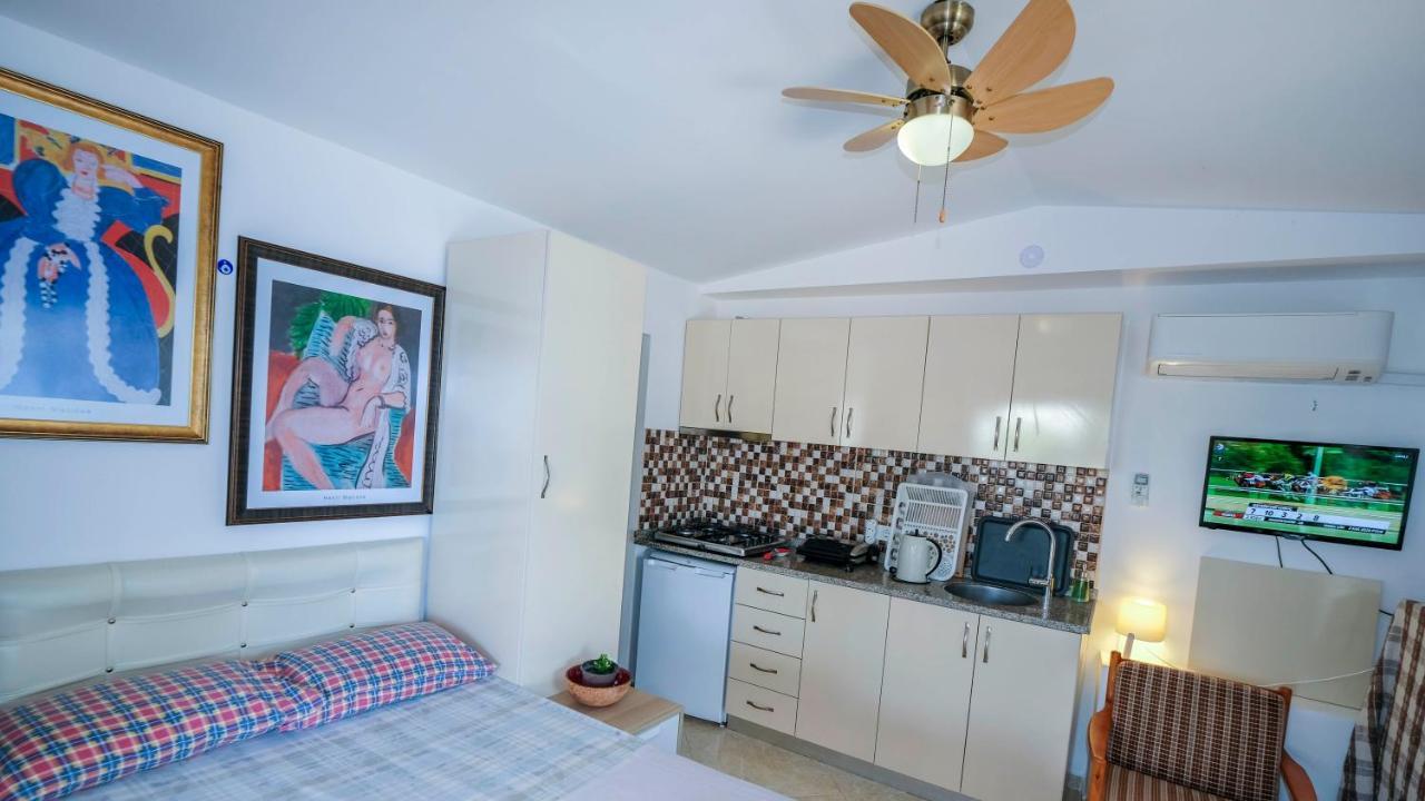 Teras Butik Apart คาราบูรุน ภายนอก รูปภาพ