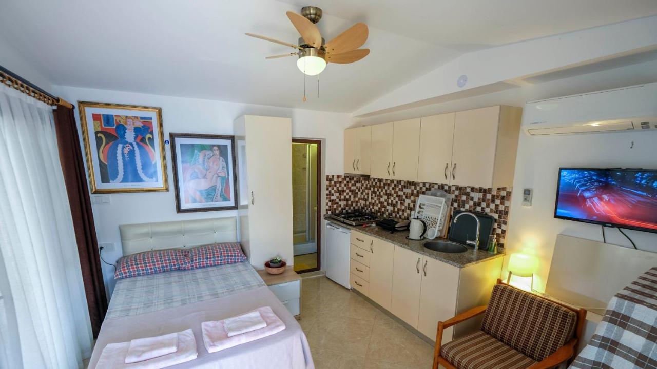 Teras Butik Apart คาราบูรุน ภายนอก รูปภาพ